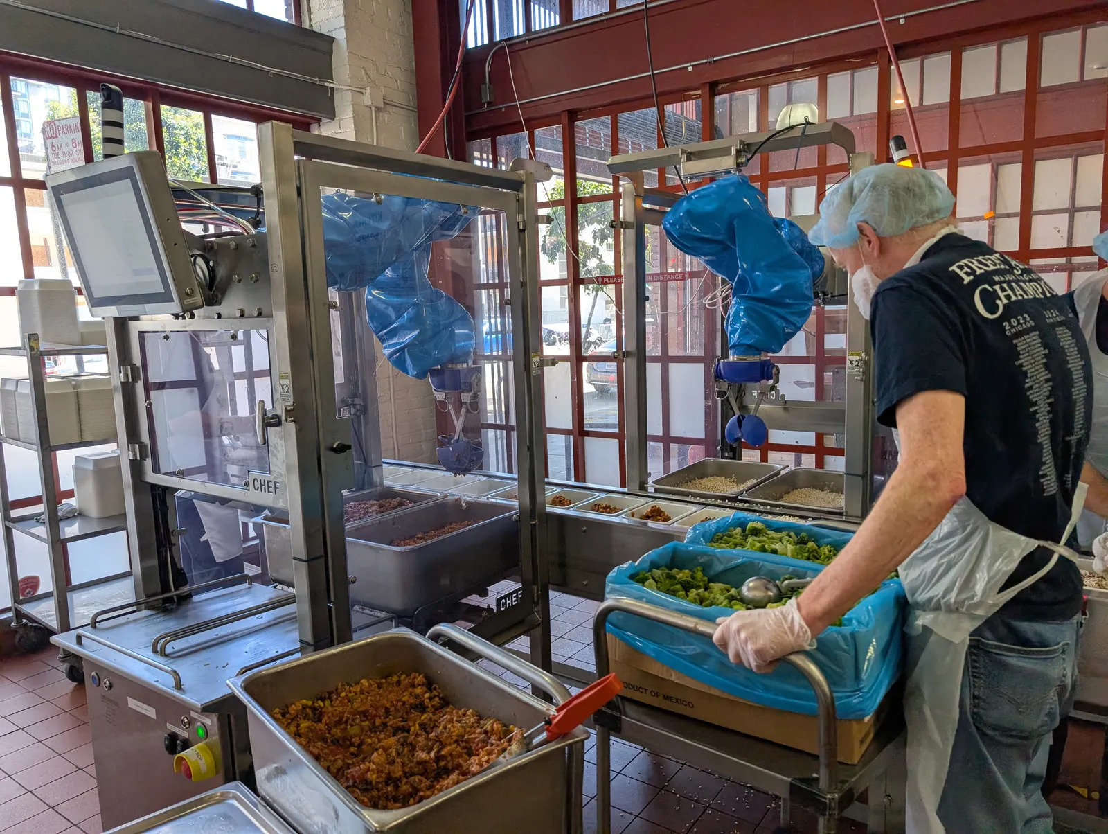 Chef Robotics robot arms plating meals at Project Open Hand