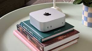 Mac Mini on stack of books